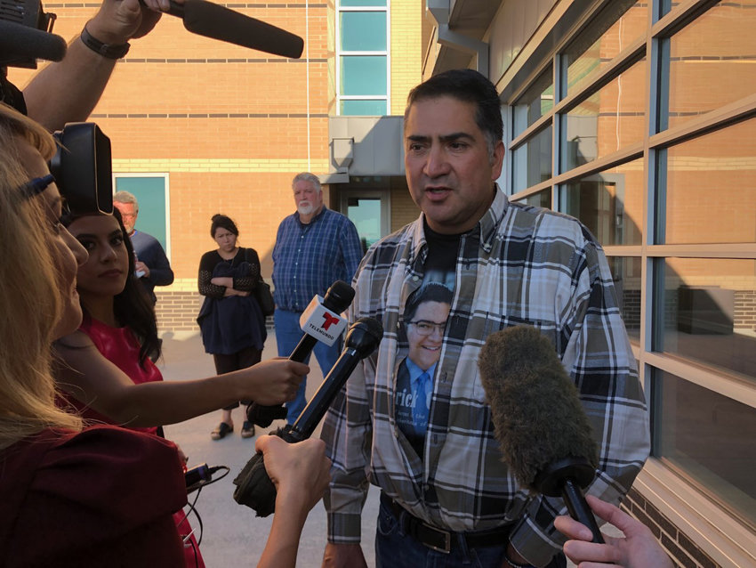 John Castillo speaks with reporters following the first day in a preliminary hearing for one STEM School Highlands Ranch shooting suspect in 2020. Castillo’s son, 18-year-old Kendrick, died rushing the older of the two suspects.